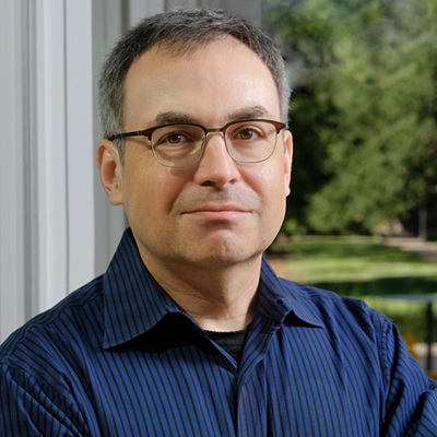 A man wearing a blue shirt